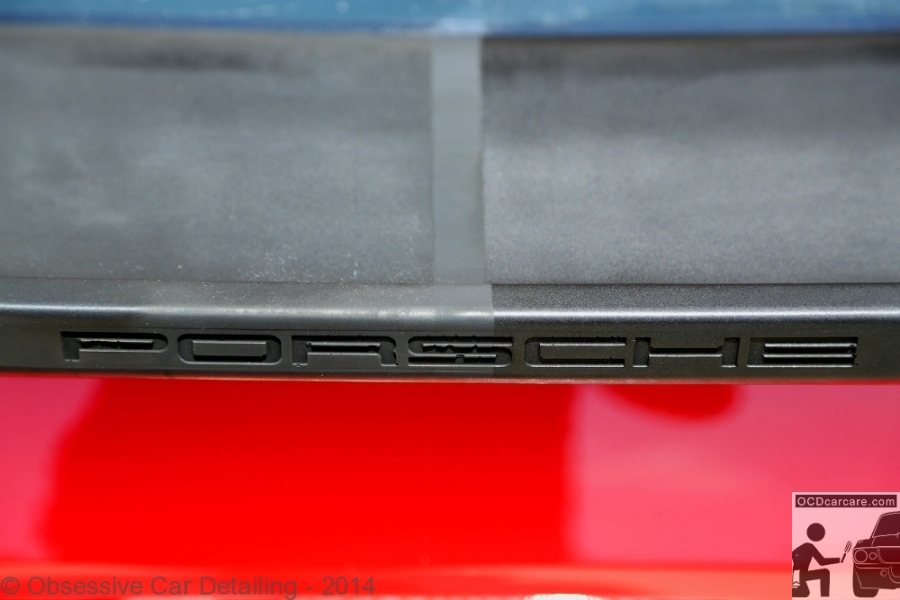 Porsche 944 - Pasadena, Ca. - 50/50 shot rubber spoiler restoration - paint correction, water spot removal, paint coating. - www.ocdcarcare.com - (949) 427-1191 - info@ocdcarcare.com