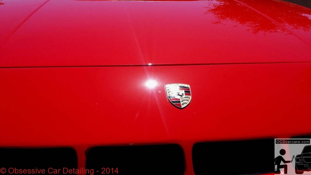 1983 Porsche 944 - Pasadena, Ca - AFTER - badge area - clay bar, iron x, two step paint correction, water spot removal, protective paint coating. - www.ocdcarcare.com - (949) 427-1191 - info@ocdcarcare.com