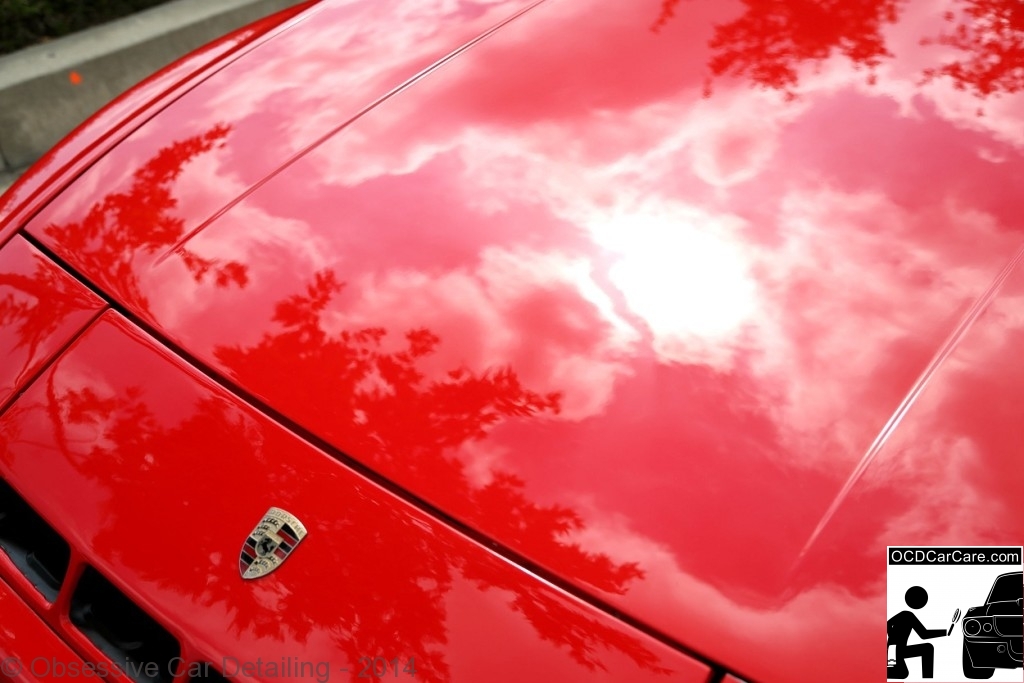 1983 Porsche 944 - Pasadena, Ca - AFTER - hood reflection - clay bar, iron x, two step paint correction, water spot removal, protective paint coating. - www.ocdcarcare.com - (949) 427-1191 - info@ocdcarcare.com