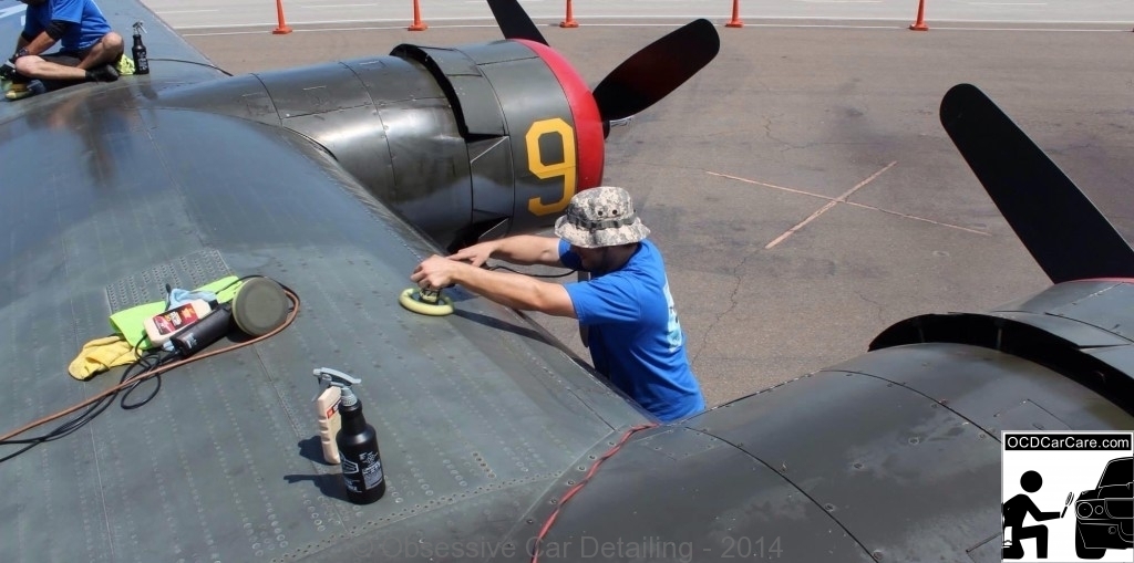 Christopher Brown of OCDCarCare polishes the port side wing of Witchcraft. - www.ocdcarcare.com