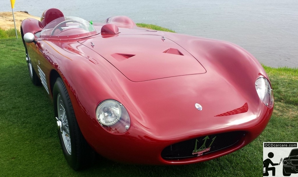 The Maserati 150S rests on the Pebble Beach lawn, basking in the peaking rays of sun at the 2014 Pebble Beach Concours d' Elegance. The Stunning 1956 Maserati 150S on the lawn at the 2014 Pebble Beach Concours d' Elegance. Los Angeles Ca, prepared by OCDCarCare Los Angeles
