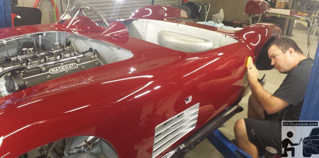 Scott Nichols of Distinct Detail carefully applies the first coat wax on this Maserati 150S. Scott Nichols of Distinct Detail carefully applies the first coat wax on this Maserati 150S.