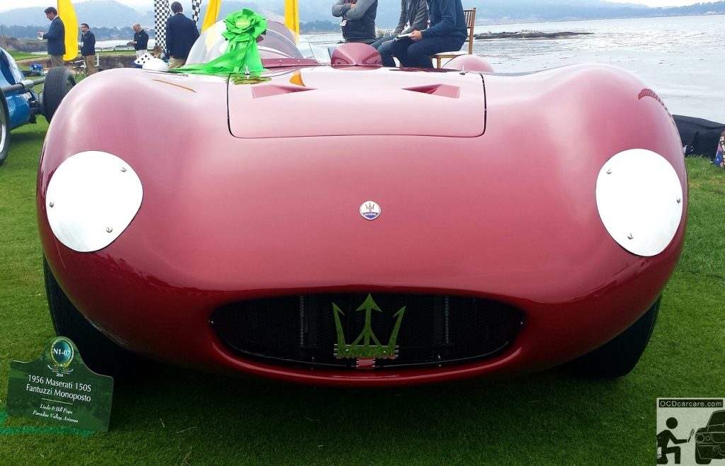 Front end view of the Maserati 150S as it rests beautifully on the lawn at the 2014 Pebble Beach Concours d' Elegance. 1956 Maserati 150S rests beautifully near the surf on the lawn at the 2014 Pebble Beach Concours d' Elegance. auto detailing near me, detailer pasadena ca - www.ocdcarcare.com