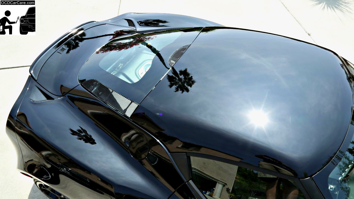 Sun Reflection on this jet black Alfa Romeo 4C displays refined, glossy, clear, and reflective paint with a nano coating by OCDCarCare.