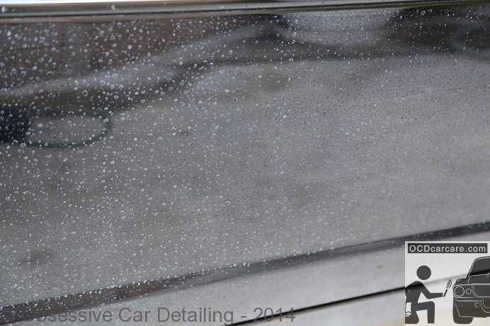 2006 Cadillac CTS - extreme hard water spots before multi phase paint correction - www.ocdcarcare.com