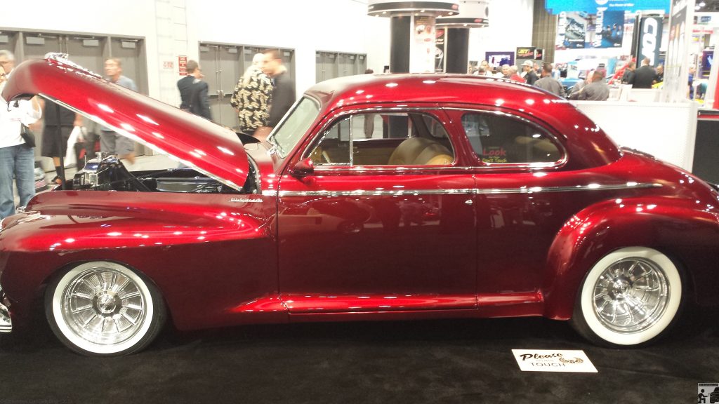 SEMA 2013 - 1940 Olds received full paint correction in the House of Kolors booth. 