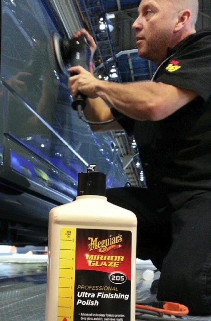 Kevin Brown of Buffdaddy.com at 2014 SEMA Polishing with the KBM method and Meguiars M205. Kevin Brown of www.Buffdaddy.com at 2014 SEMA Polishing with the KBM method and Meguiars M205. Santa Maria, Ca.